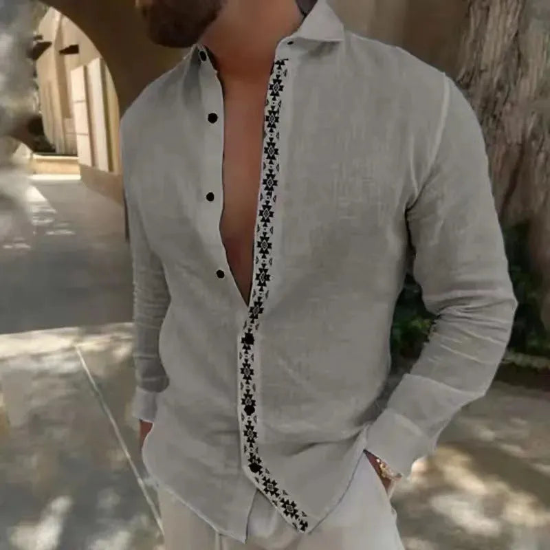 Cotton and linen printed men's shirt with lapel button, long sleeves, and collage stitching in emerald green