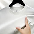 Men's thin cotton t-shirt with drop shoulder design in solid colour options like beige, sky blue, and pitaya