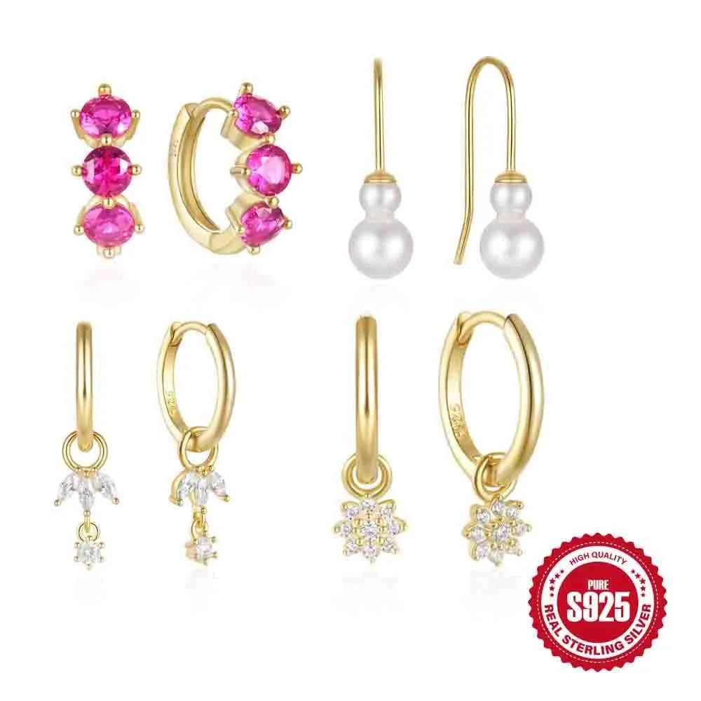 A pair of geometric sunflower design earrings in sterling silver with golden zircon stones.