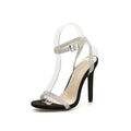Women's black suede stiletto heel sandals with rhinestone decoration on a shallow-cut upper
