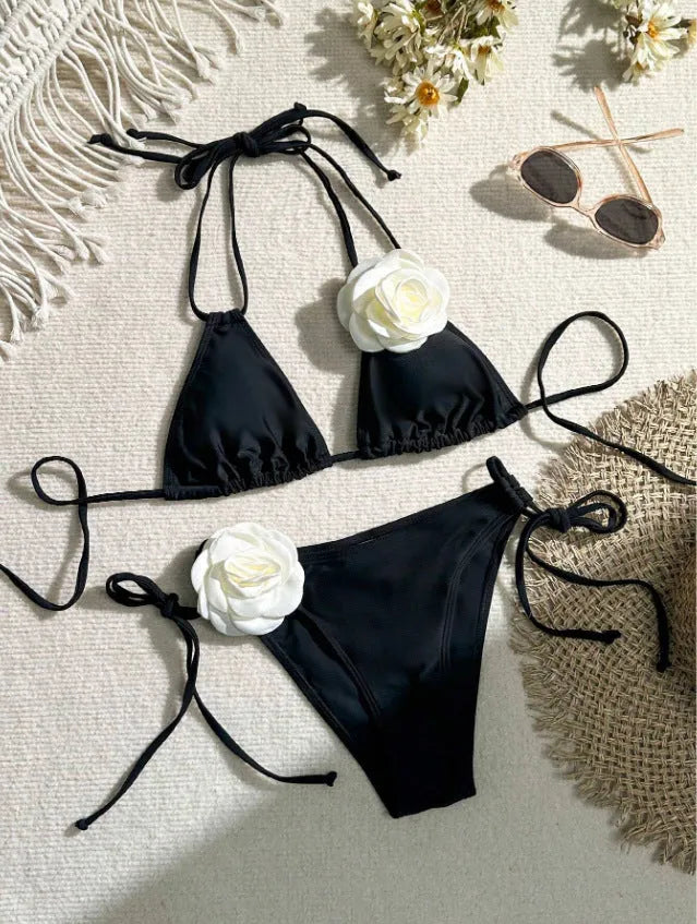 Black two-piece bikini with 3D flower lace detail and a split backless briefs design.