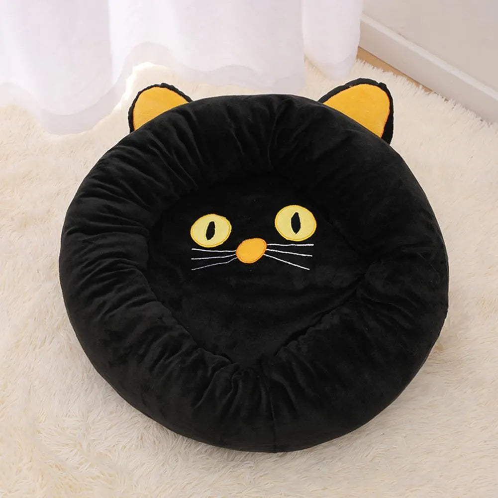 Black cat-shaped velvet pet bed with raised edges for head support in two size options
