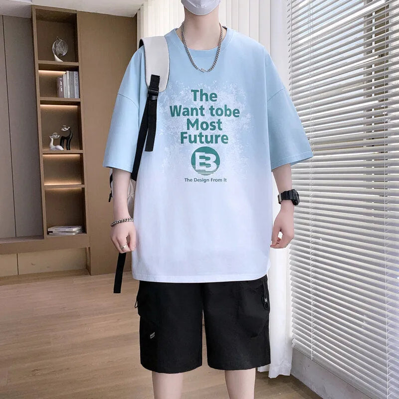 Boys dark blue t-shirt with white Jacquard printed letters and drop-shoulder short sleeves.