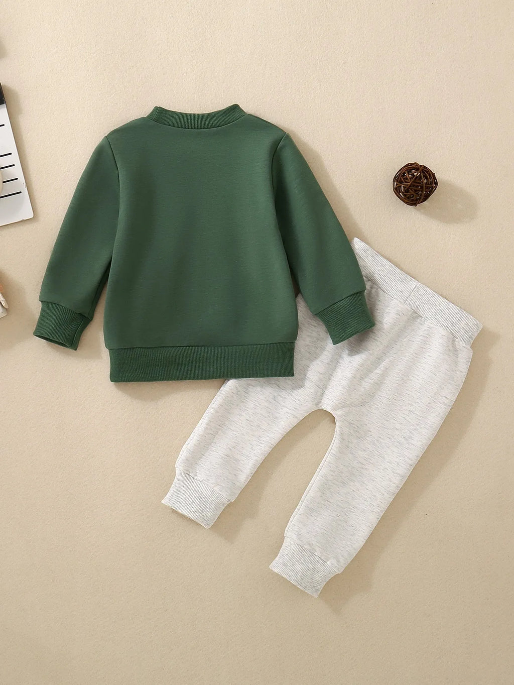 Boys and girls cotton letter long sleeve sweater suit in navy blue with matching pants set on white background.