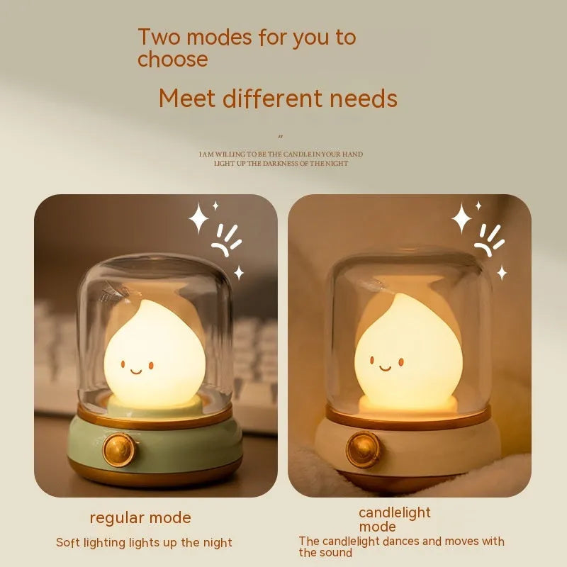 Green retro USB rechargeable desk lamp with adjustable knob on wooden table