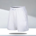 Men's loose-fit quick-drying polyester sports shorts in black with elastic waistband