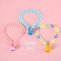 Macaron candy coloured plastic pet collar for cats, dogs and rabbits on a white background.