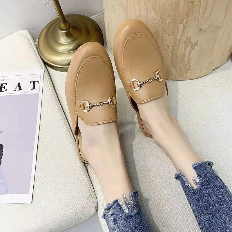 Women's PVC closed toe half slippers with buckle fastening in white, black and brown colours
