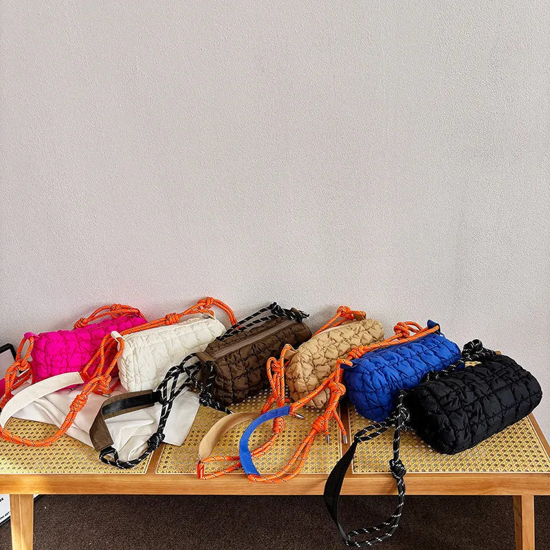 Soft pillow-shaped women's nylon messenger bag in choice of colours on adjustable crossbody strap.