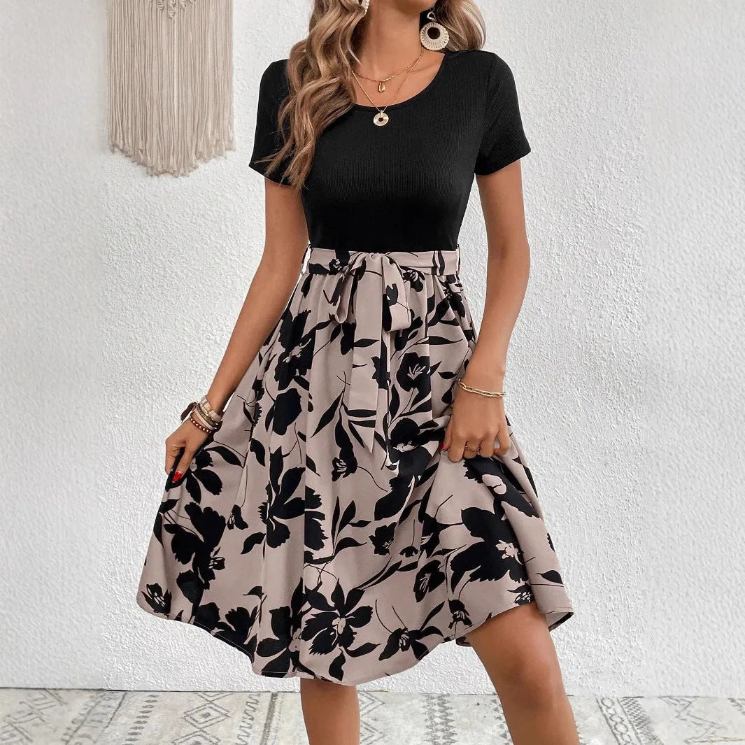 Khaki women's A-line dress with floral printing and lace-up detail on the front.