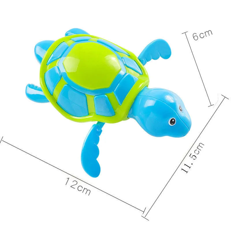 Plastic baby tortoise bathroom toy floating in water, random colour, approximately 12 cm long