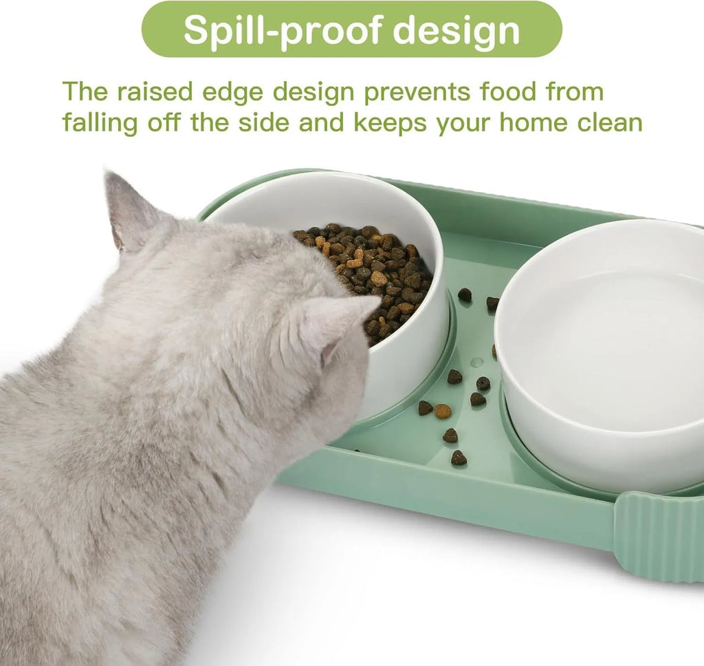 Green ceramic raised cat bowl set with two bowls on a 15° tilted stand and non-slip base.