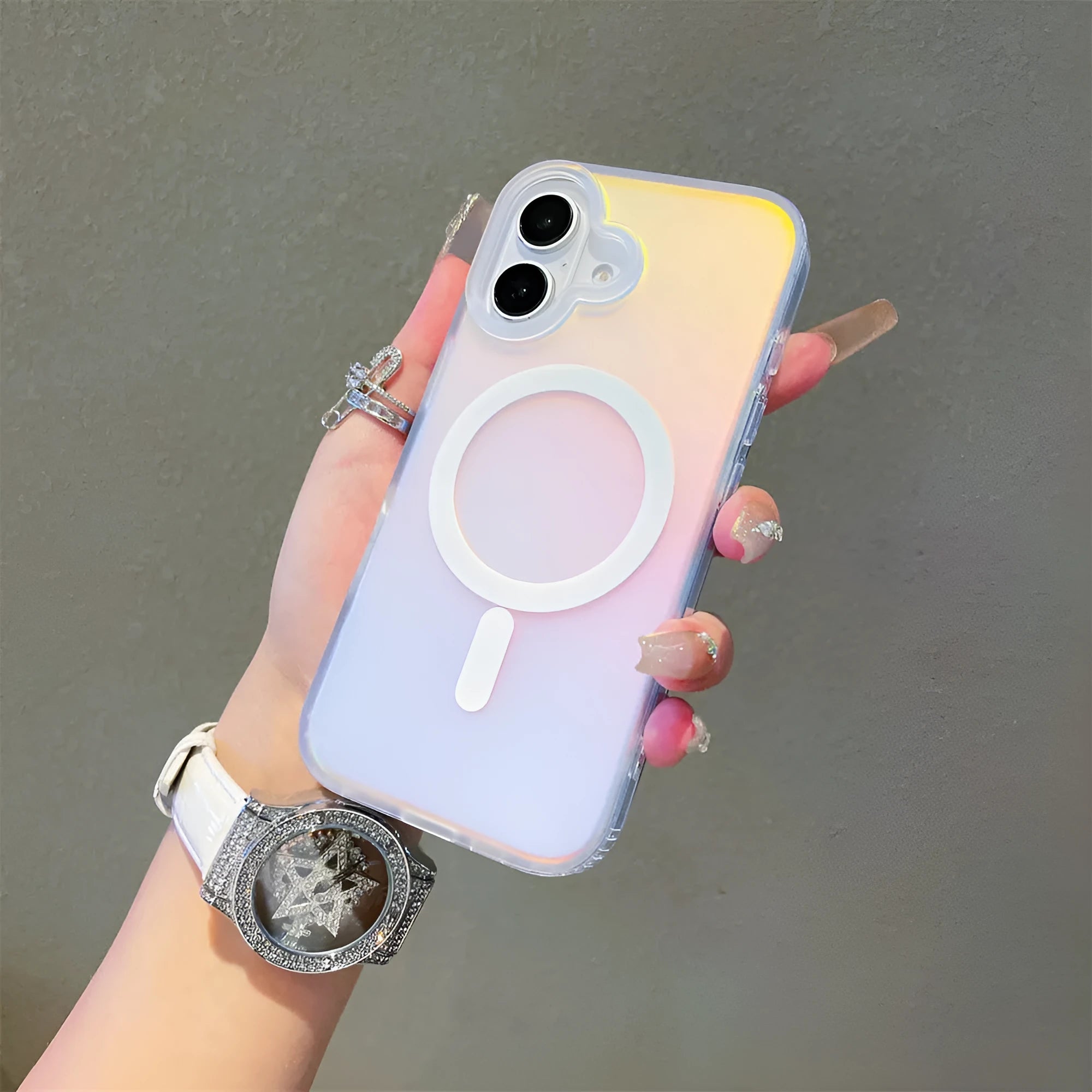 Laser gradient frosted magnetic back cover case for iPhone 17 series on a table