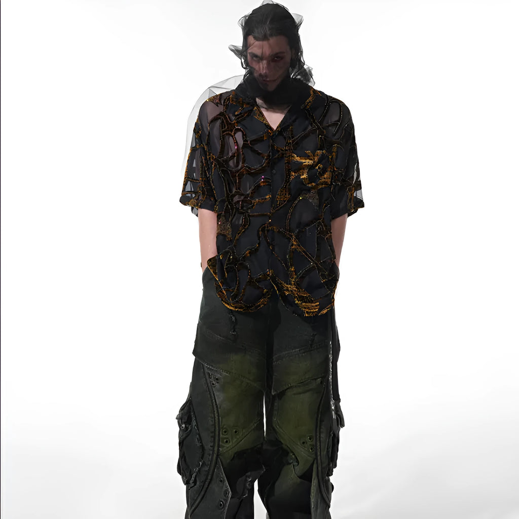 Man modelling a black and grey snake pattern translucent short-sleeved loose-fit shirt