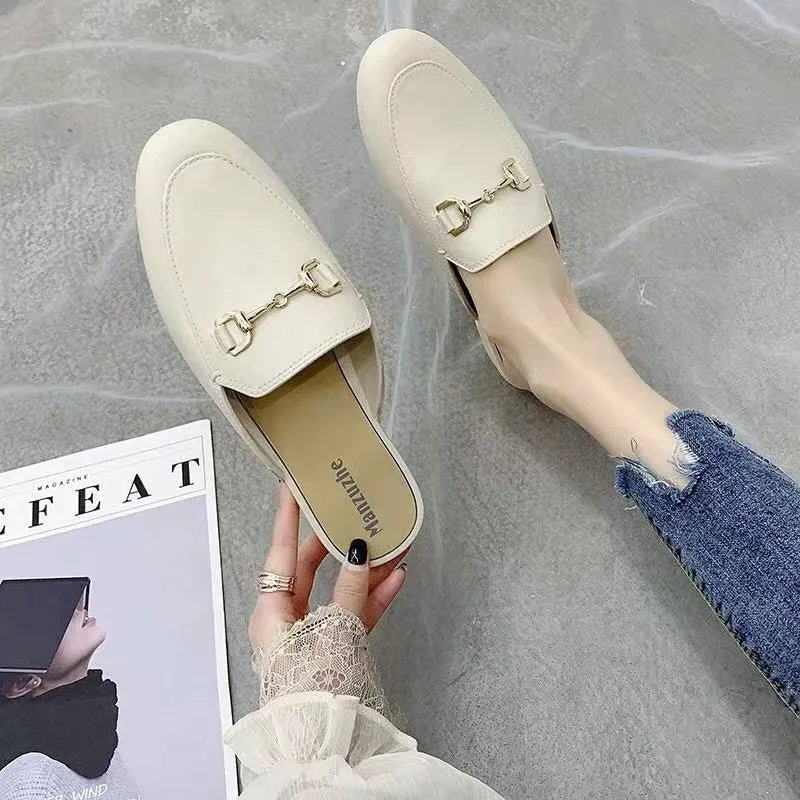 Women's PVC closed toe half slippers with buckle fastening in white, black and brown colours