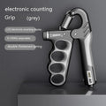 Adjustable electronic count spring grip in orange, red, or grey colour with PP construction
