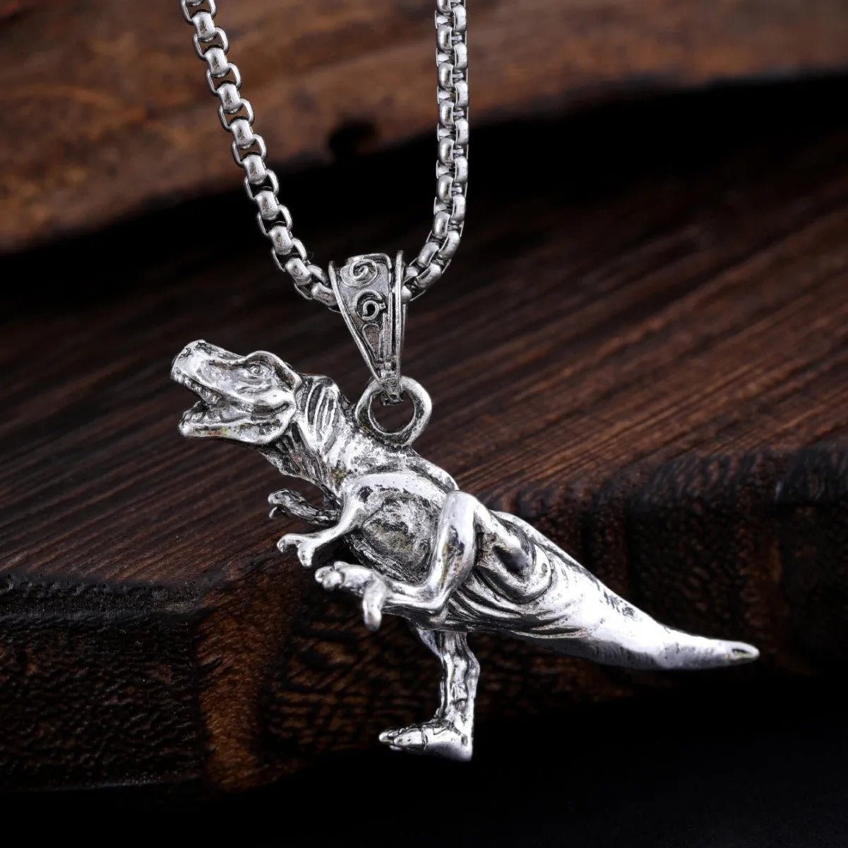 New Hip Hop Style Titanium Dinosaur Pendant necklace on display