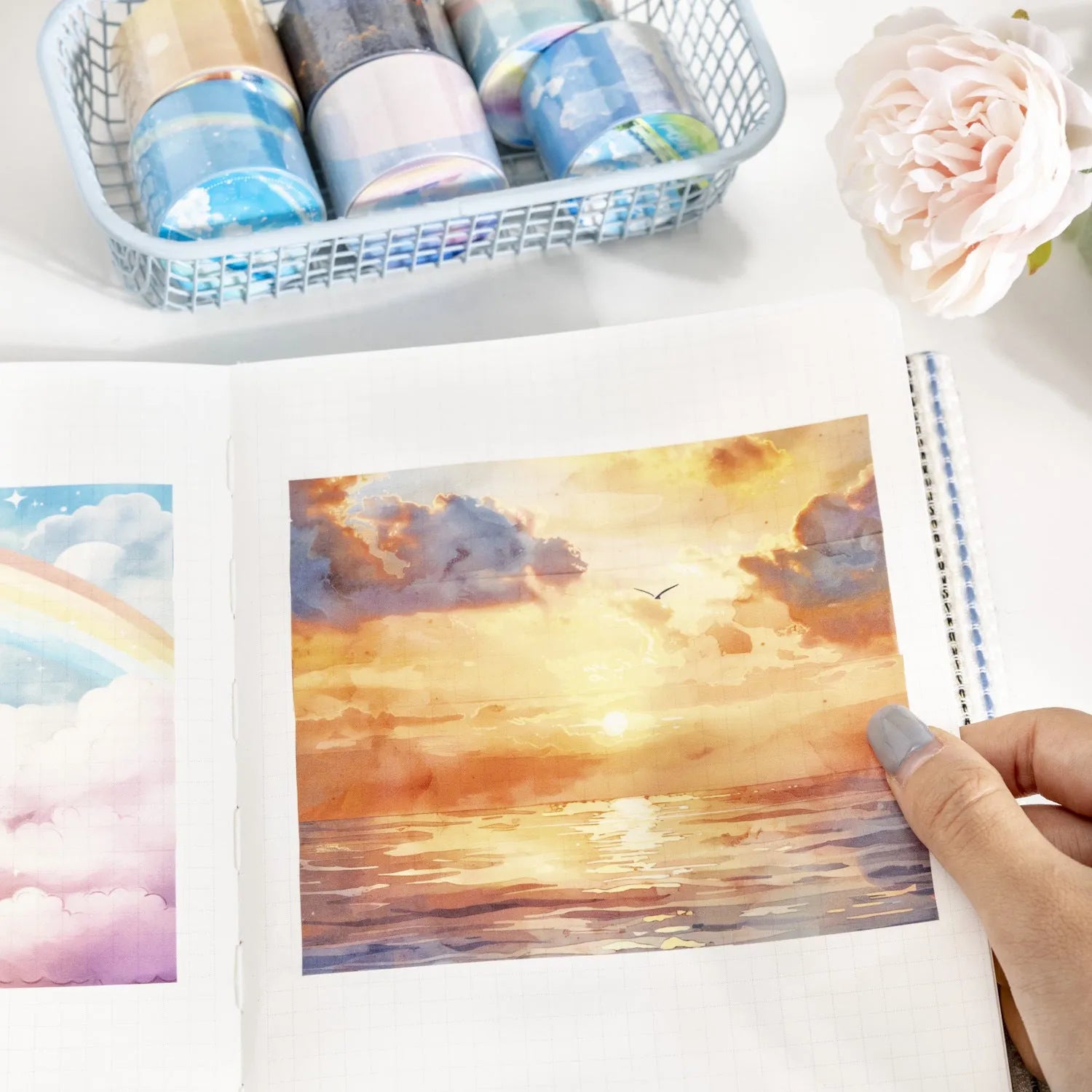 Japanese paper decorative tape roll with sky patterns including clouds, twilight and nebula designs