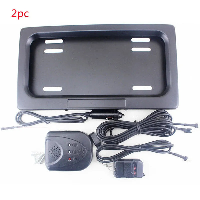 Black flipping license plate frame in iron and plastic, 314 x 169 mm, for U.S. license plate size