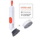White and green liquid-filled cleaning brush with soap dispenser handle and two brush heads for kitchen cleaning