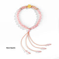 Crystal bracelet with hand-woven red rope strap and peach blossom design in diamond shape