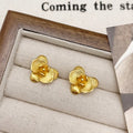 Retro flower earrings for women in gold or silver with petal detailing