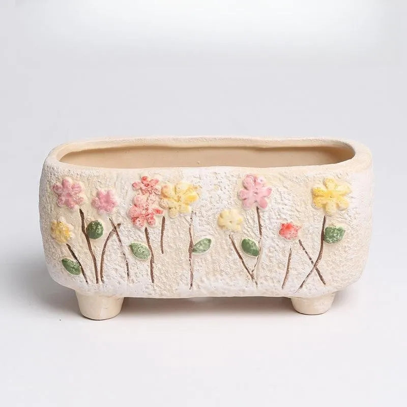 Rectangular hand-painted ceramic succulent flower pot showing floral design