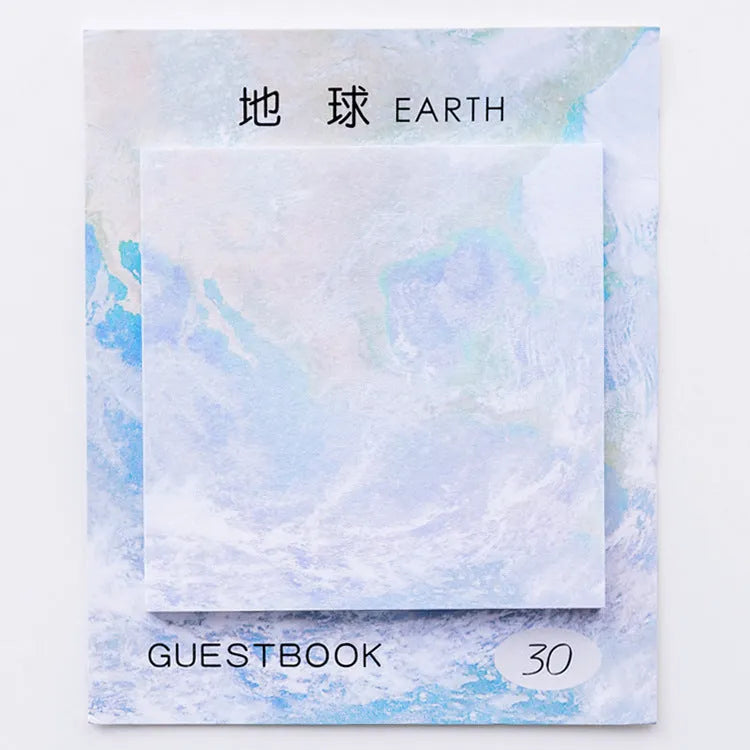 Square planet-themed sticky note pad showing oil painting designs of moon, earth, and mars.