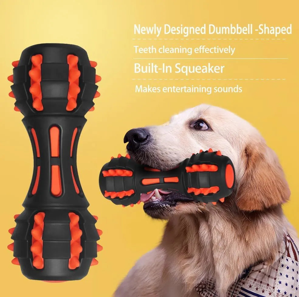 Red dumbbell-shaped durable rubber dog toy for aggressive chewers with a squeaker inside.