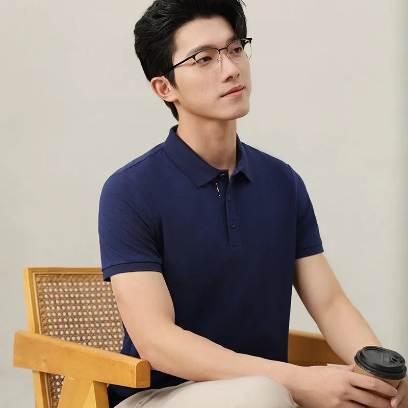 Solid colour ice silk catering work polo shirt on a hanger, shown in a light blue shade with short sleeves.