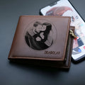 Men's genuine leather zip closure wallet showing card slots and cash compartment.