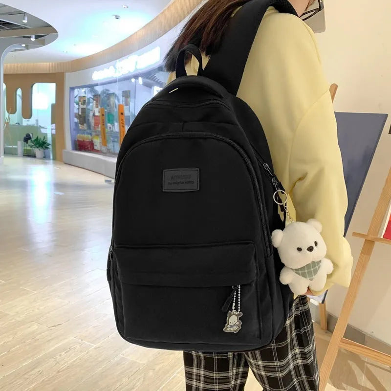 Large capacity nylon backpack in beige with solid colour street style and anti-theft design