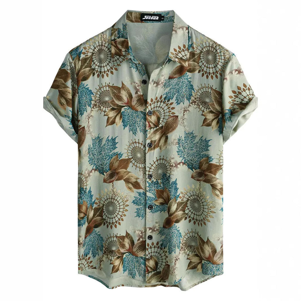 A man wearing a short sleeve floral print Hawaiian shirt with a button-up front and lapel collar.
