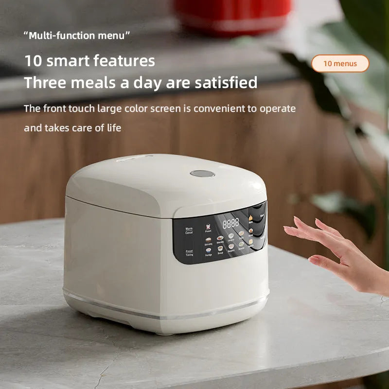 White 2L smart rice cooker with black microcrystal panel and PP steamer on kitchen counter