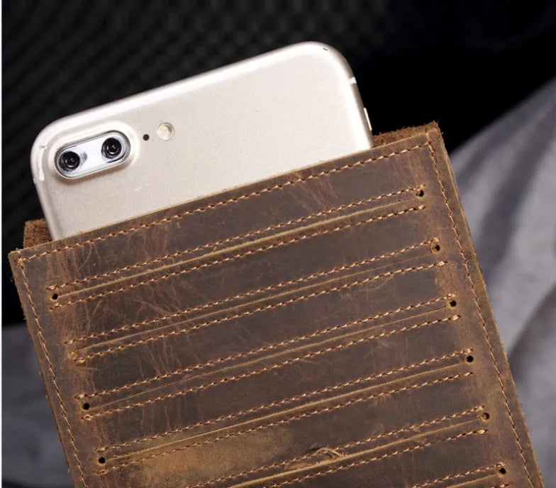 Men's long leather card wallet in crazy horse hide with 18 card slots and a phone compartment.