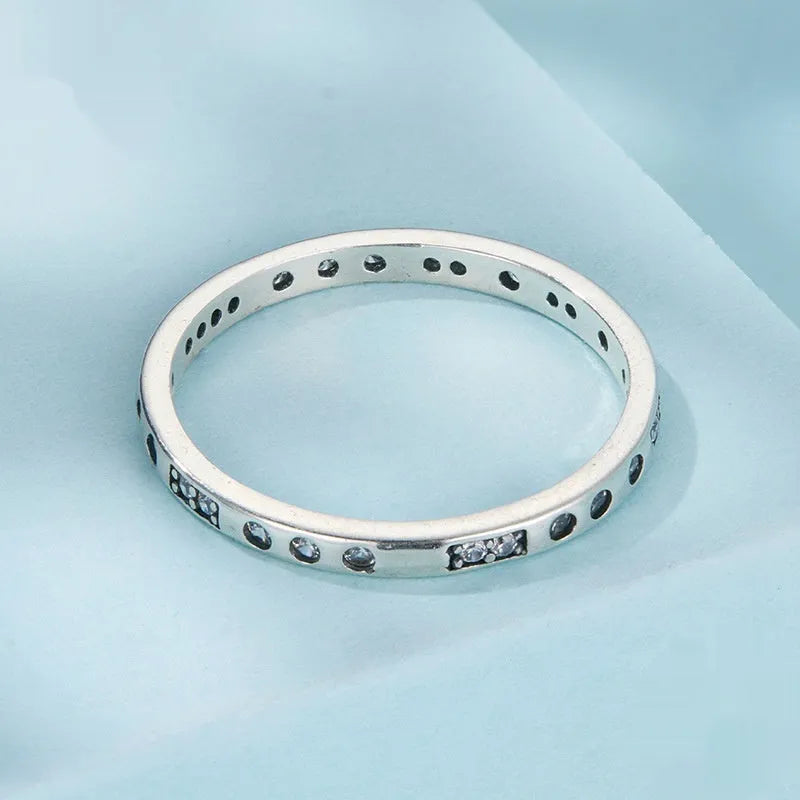 Silver coloured I Love You ring with oxidised black finish, simple bracelet band style.