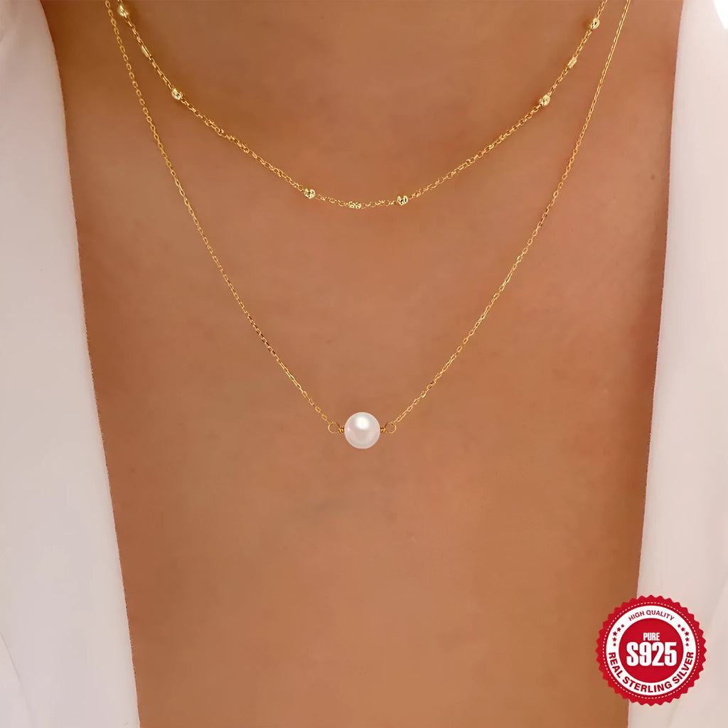 S925 sterling silver double layer pearl necklace with geometric pendant on a ball bead chain.