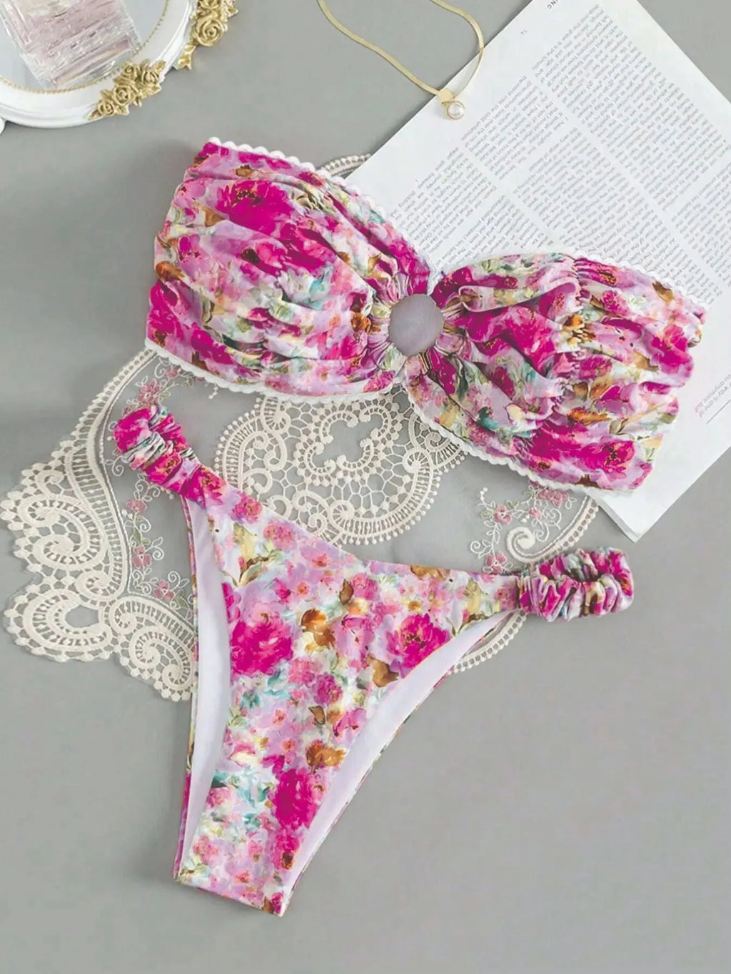 Women's printed floral bikini with lace trim and backless tube top design