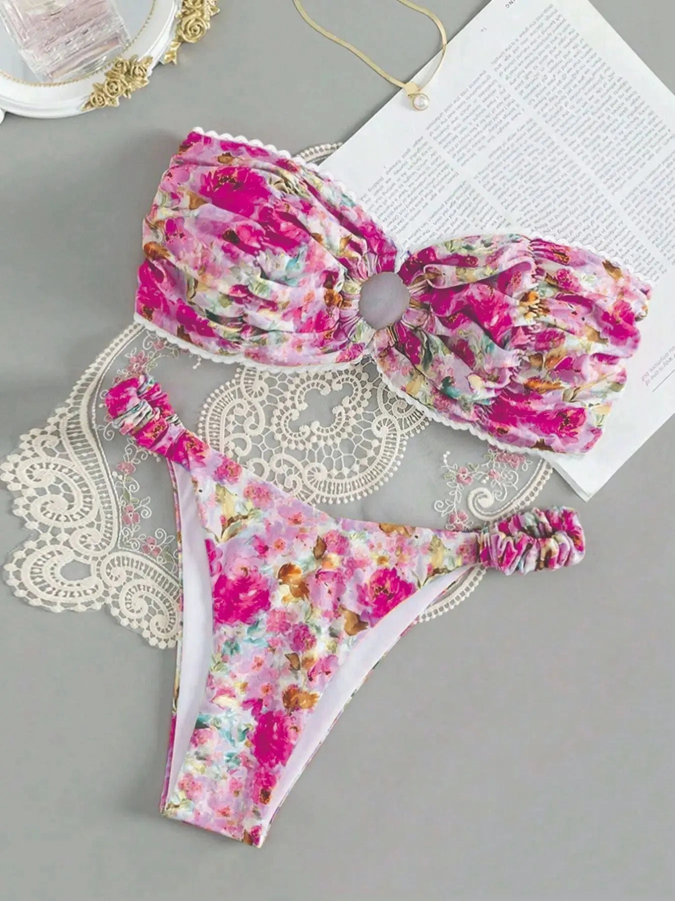 Women's printed floral bikini with lace trim and backless tube top design