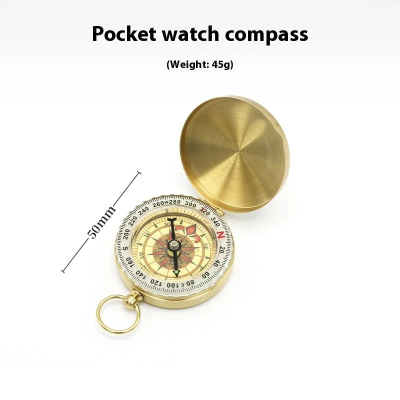 Gold brass flip compass with luminous dial and lid closed, 50mm diameter for outdoor navigation