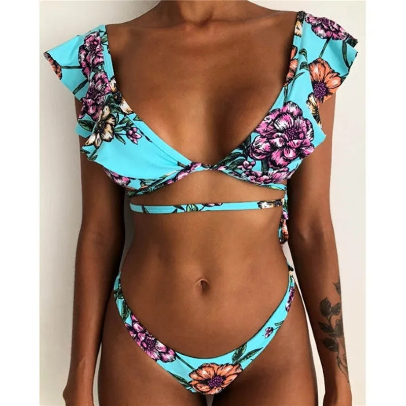 Yellow floral print split bikini swimsuit on a model