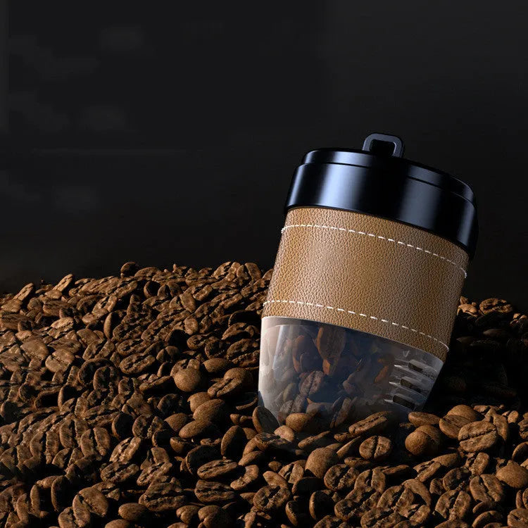 Coffee cup shaped solid car air freshener in black, brown, white, orange, or green.