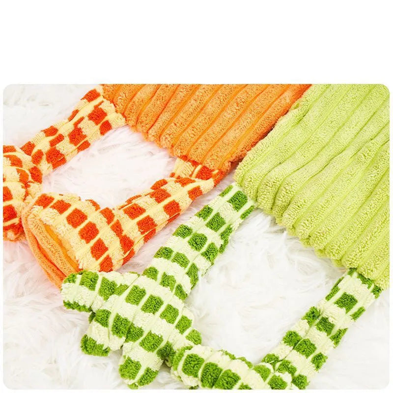 Green and orange immortal squeaker plush dog toy for aggressive chewers with reinforced stitching