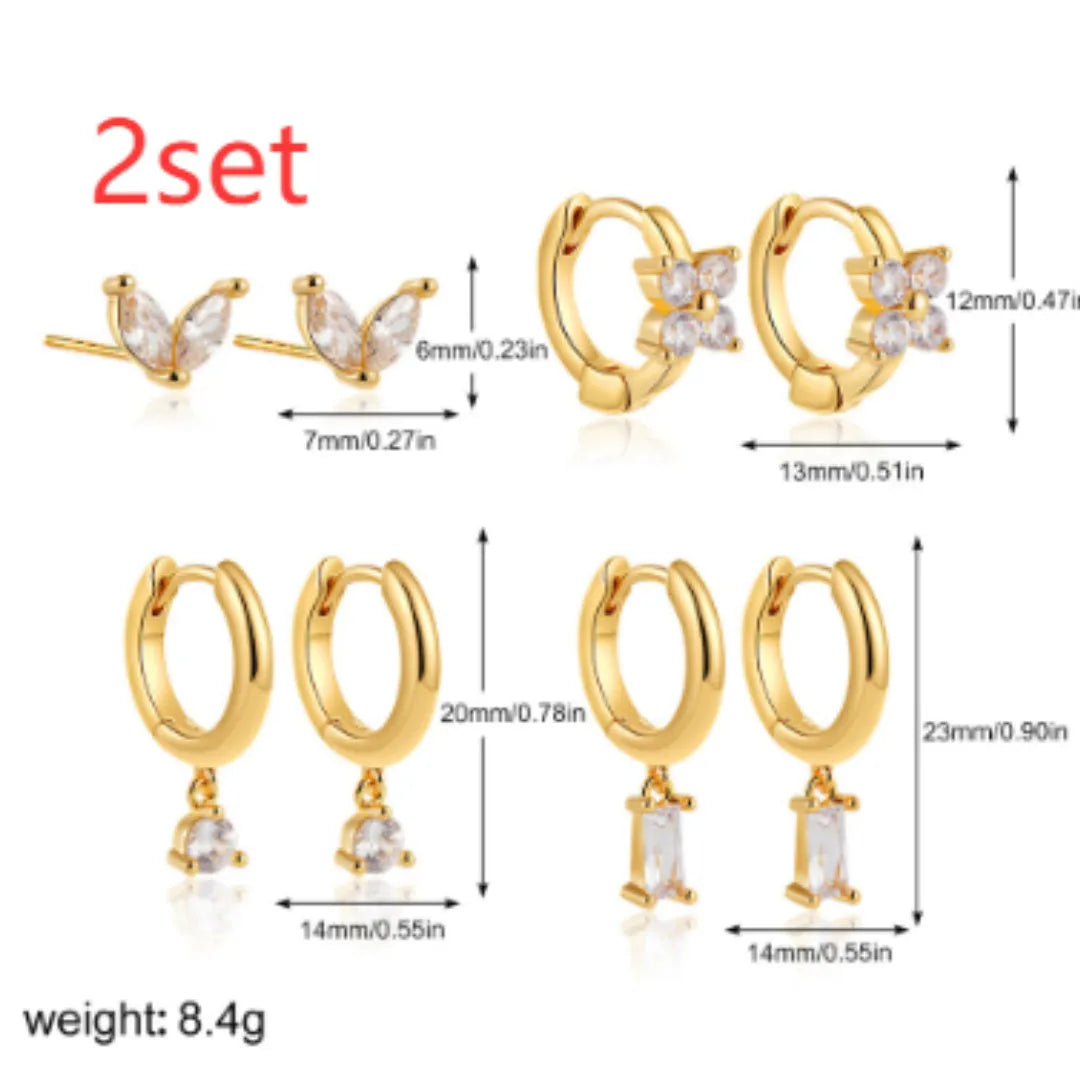 Copper geometric earrings set with star, ellipse, ring and quadrilateral designs in gold or silver finish