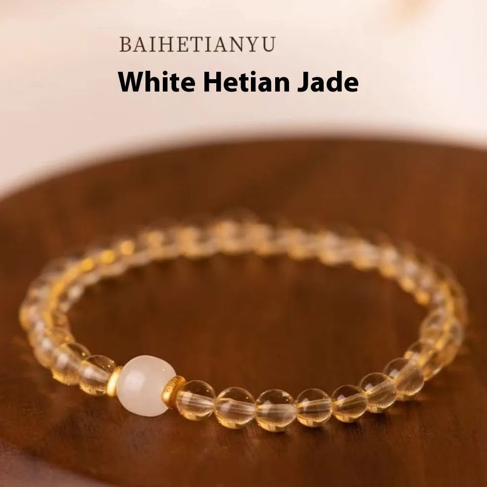Rutilated quartz bracelet with Brazilian quartz beads in green or white colour options
