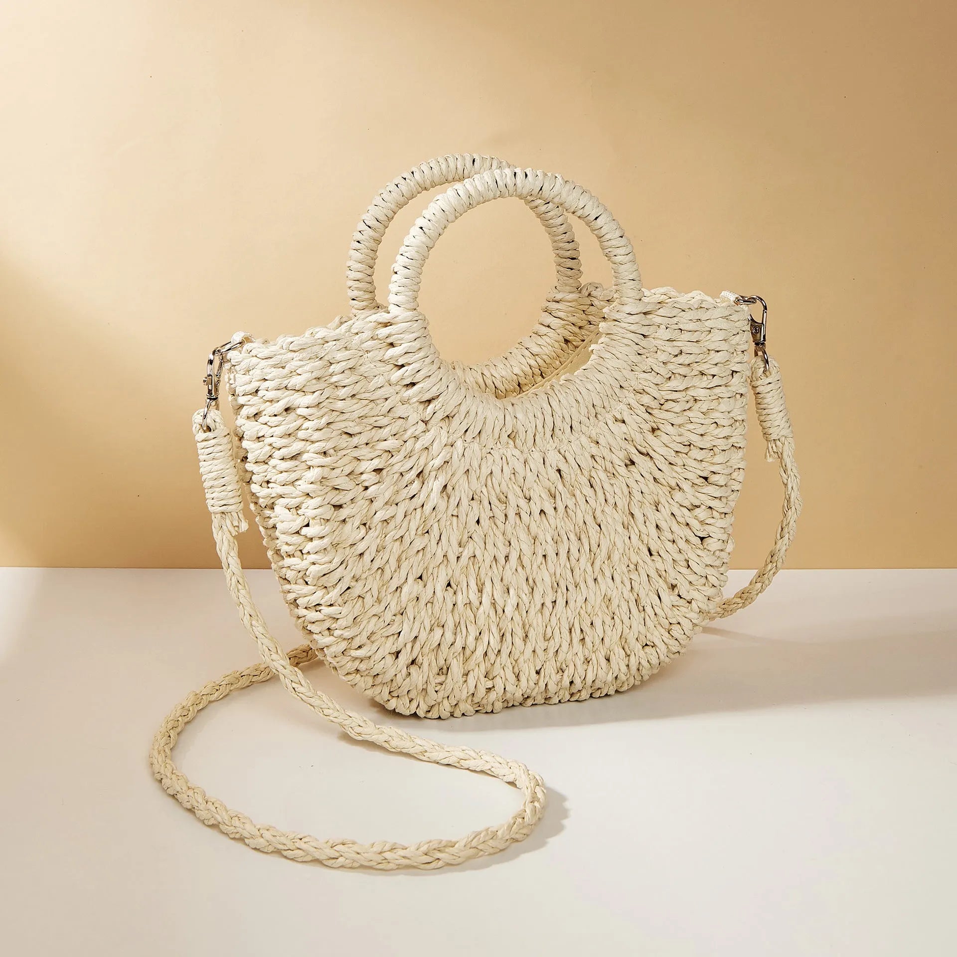 Woven straw crossbody beach bag in beige, 24cm height, peach skin lining, six colour options