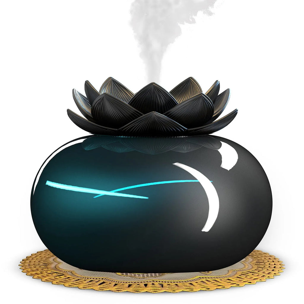 Pure black round Lotus aromatherapy humidifier with USB cable on a wooden surface.