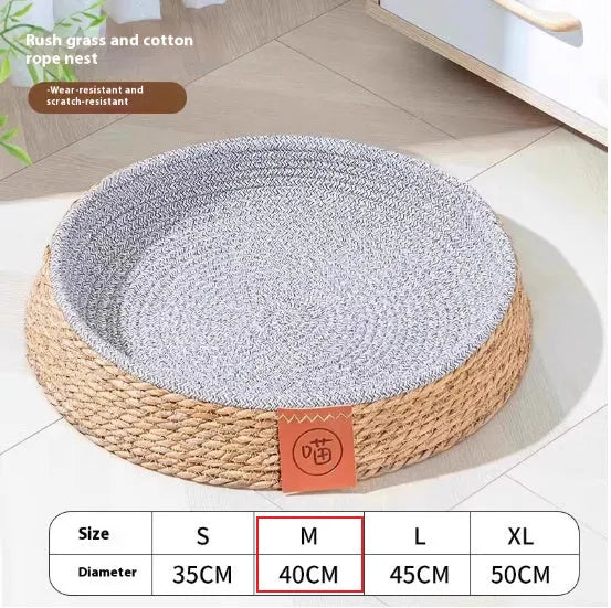 Brown woven rattan cat nest pet bed shown in size L on a floor.