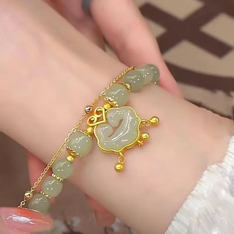 Women's green safety lock bell pendant bracelet with electroplated mixed materials