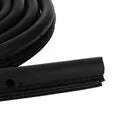 Black rubber sliding door seal strip for Toyota Hiace High Roof, shown coiled, 5 metres in length.